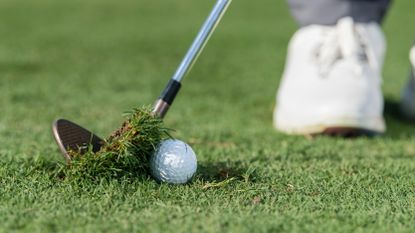 PGA pro Dan Grieve duffing a chip shot at Infinitum Golf Resort in Spains