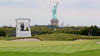 The second green at Liberty National with the Statue of Liberty in the background