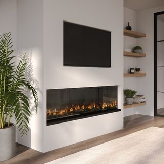 electric fire inset into wall with TV recessed above