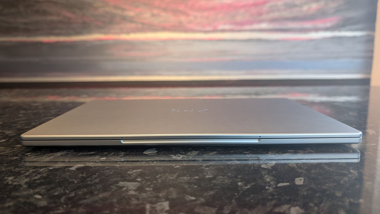 The Dell XPS 13 (2026) laptop pictured on a black marble worktop.