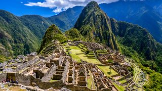An aerial view of the ruins at Machu Picchu in the Andes mountains.