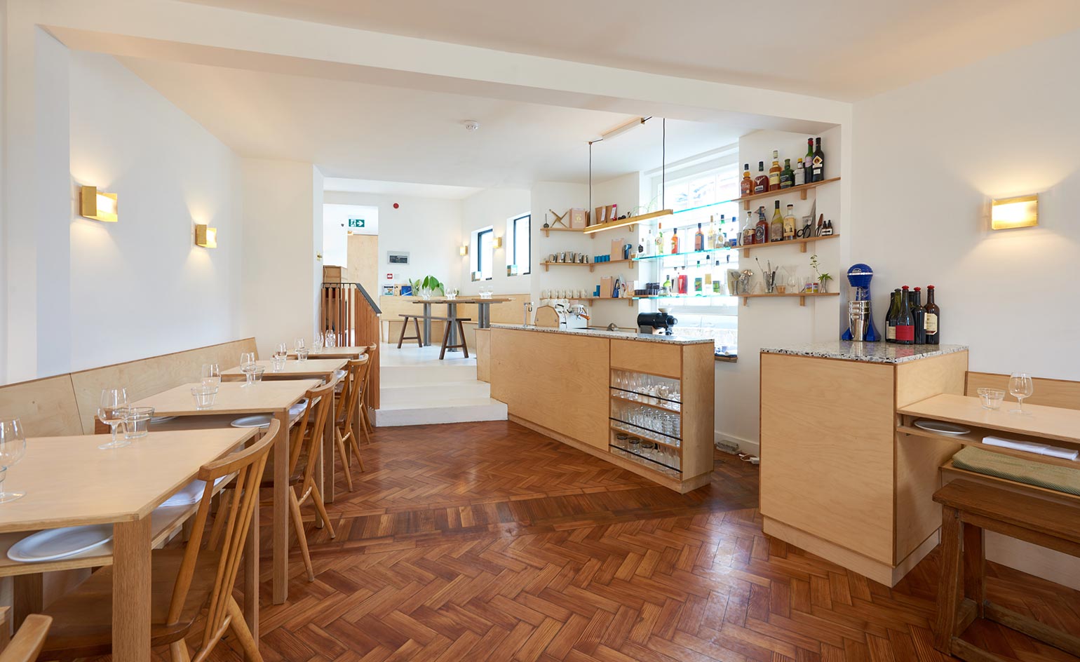 Long view of restaurant counter & tables