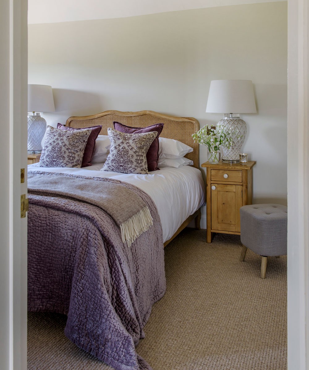 white themed bedroom with carpet flooring