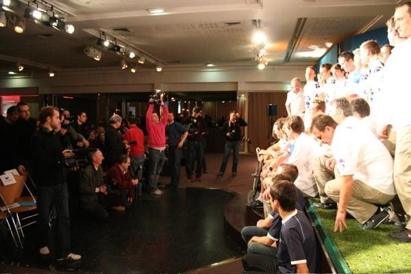 A multitude of press are present to record events