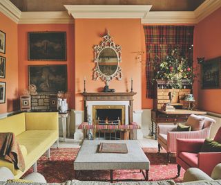 living room with orange walls