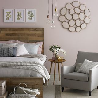 bedroom pink wall with armchair