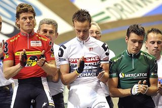 It was a sombre moment for Bruno Risi (l), Iljo Keisse and Kenny De Ketele as their fallen fellow Six Day rider was honoured with a moment's silence.