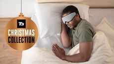 Man sleeping while wearing Ostrichpillow eye mask