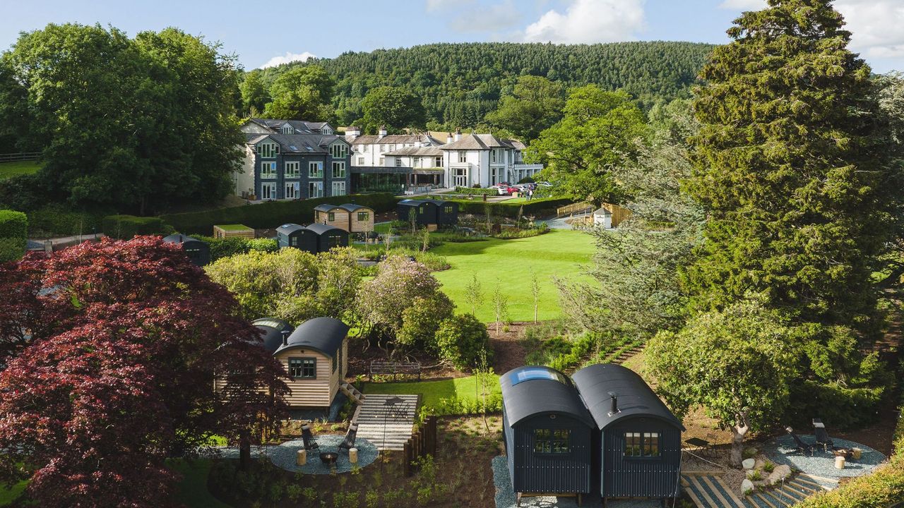 Arial view of Another Place showing building, outdoor area, grass and trees