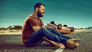 Jamie Dornan at car crash site on road in The Tourist TV mini-series