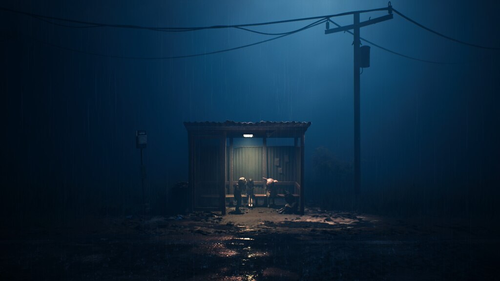 Small figures stand at a bus stop by night