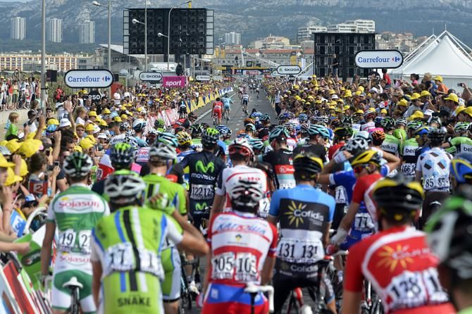 The peloton came to a stop behind the final kilometer crash
