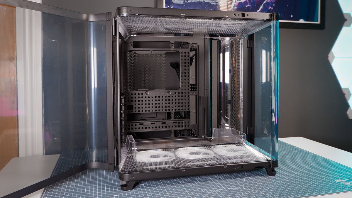 A Corsair Air 5400 PC case on a desk with various parts installed.