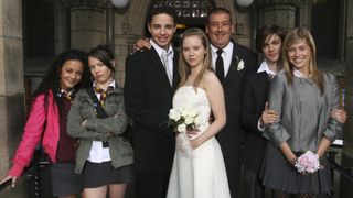 Chlo and Donte Charles alongside their closest friends on their wedding day in Waterloo Road