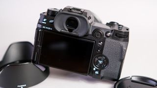 A photo of the Fujifilm X-H2S rear against a grey background.