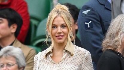 Sienna Miller attends Centre Court on day nine of the Wimbledon Tennis Championships at the All England Lawn Tennis and Croquet Club on July 09, 2024 in London, England. (Photo by Karwai Tang/WireImage)