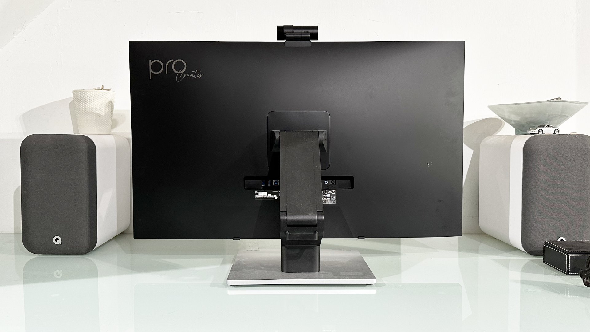 The Acer ProCreator PE320QXT on a desk in a home office during our testing process