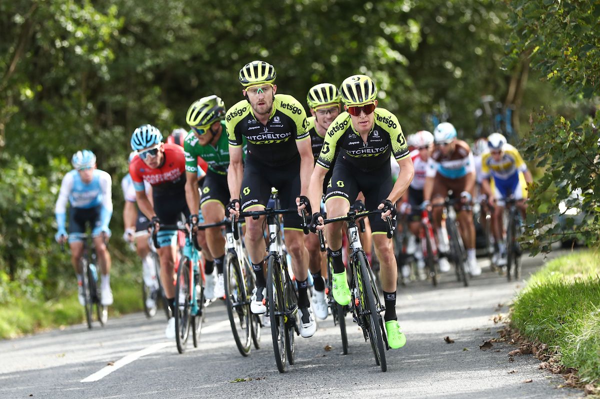 Mitchelon-Scott lead Matteo Trentin on the climb