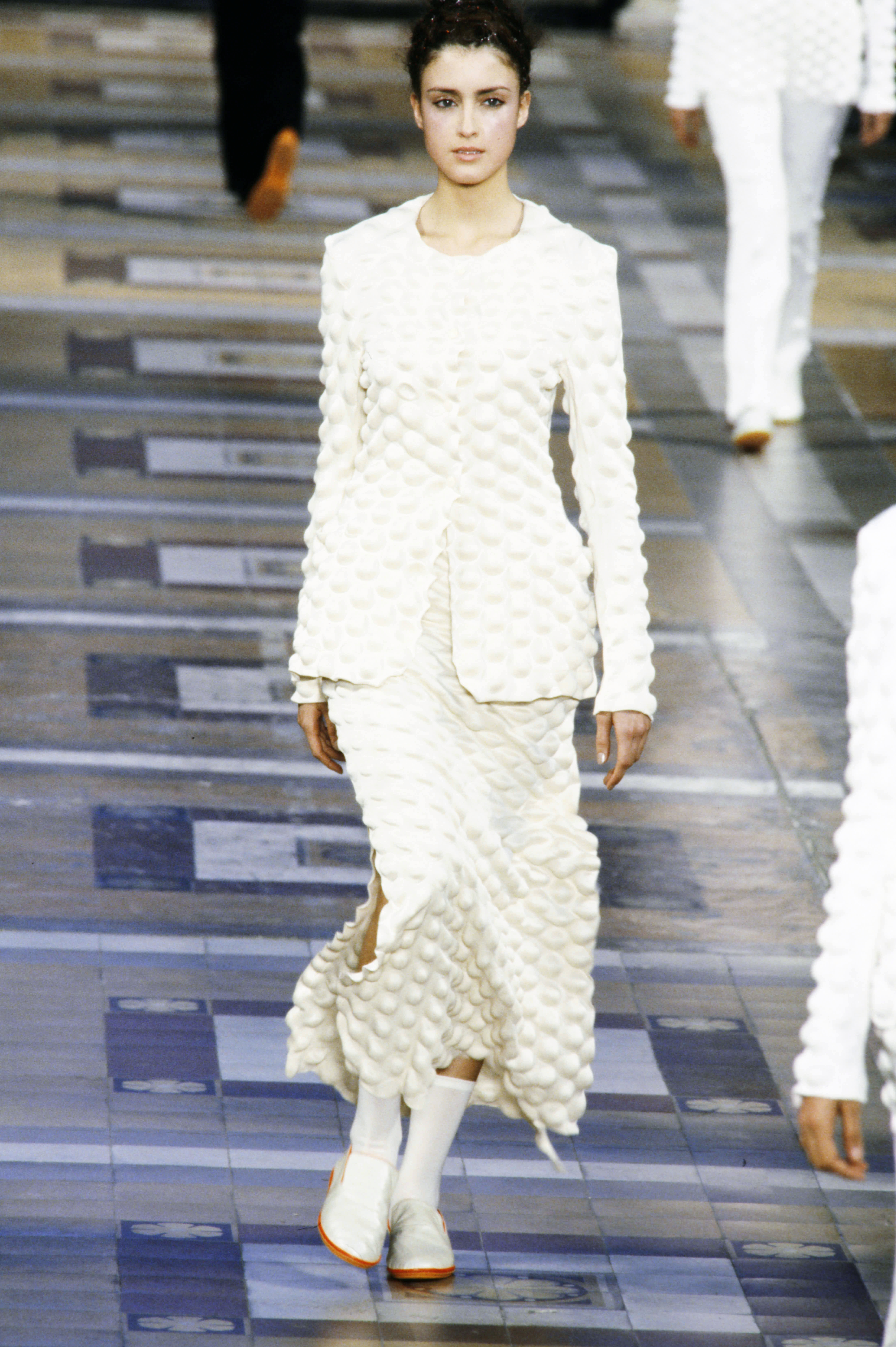 Issey Miyake egg carton styles on the Fall 2000 runway