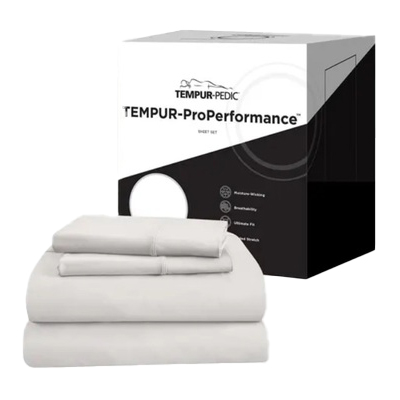 At the back of the image is the box the Tempur-Pedic Tempur-Pro Performance Sheets are packaged in. At the front, the sheet set in white, folded and neatly piled