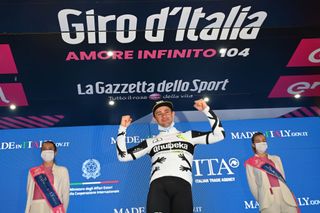 GORIZIA ITALY MAY 23 Victor Campenaerts of Belgium and Team Qhubeka Assos celebrates at podium during the 104th Giro dItalia 2021 Stage 15 a 147km stage from Grado to Gorizia UCIworldtour girodiitalia Giro on May 23 2021 in Gorizia Italy Photo by Stuart FranklinGetty Images