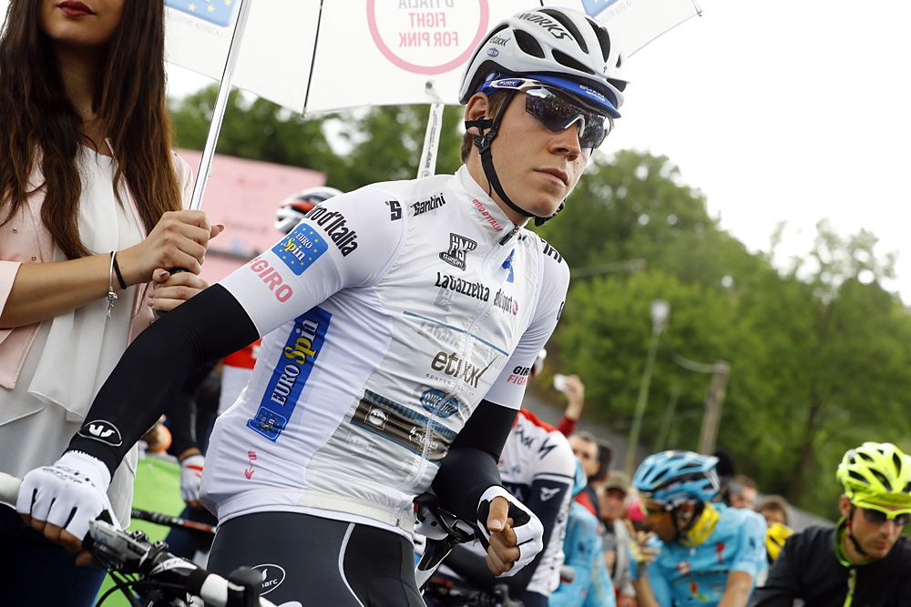 Luxembourger cyclist Bob Jungels of team Etixx - Quick Step looks on as he bears the best young rider's white jersey before the start of the 6th stage of 99th Giro d'Italia
