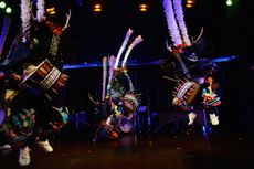 A group of shishi-odori deer dancers &mdash; Japanese folk performing artists who sing, drum and perform acrobatic dancing.