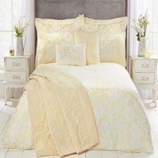 A bed with cream Julian Charles bedding