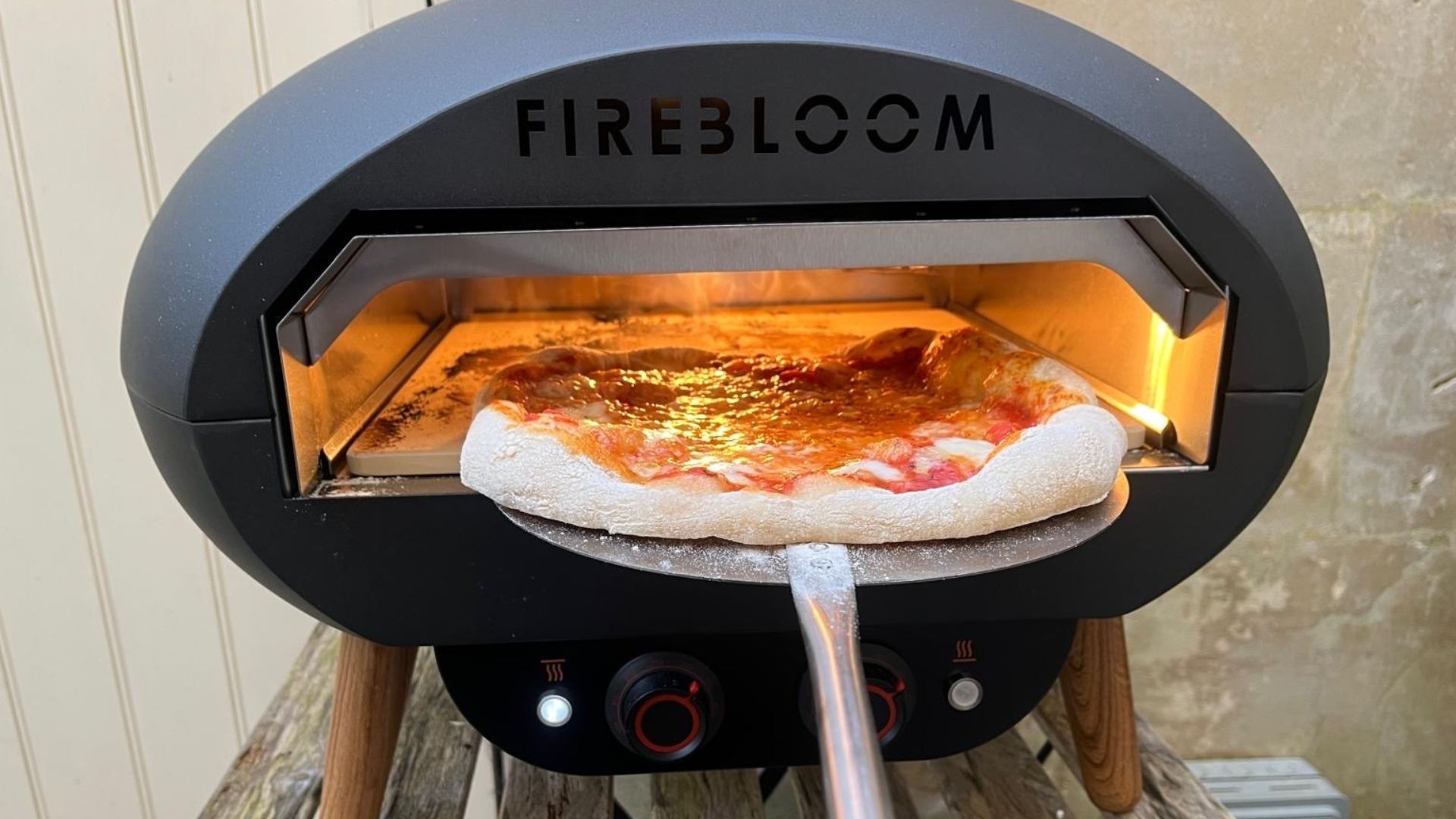 The Firebloom EP03 Electric Pizza Oven being tested in a courtyard