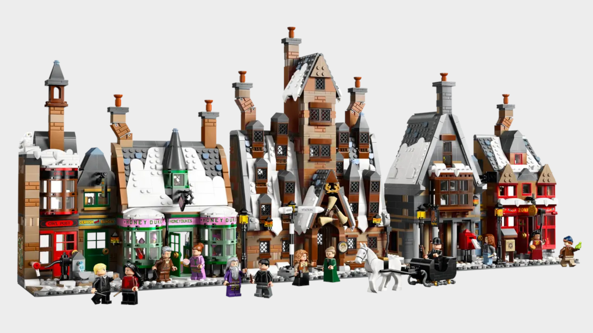 Lego Hogsmeade Village - Collectors' Edition set and minifigures against a plain background