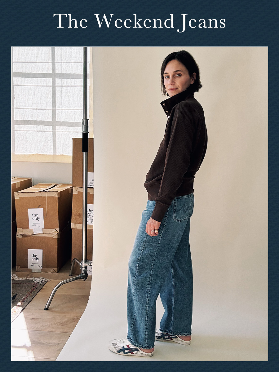 Jane Herman in a pair of relaxed jeans and a pullover.