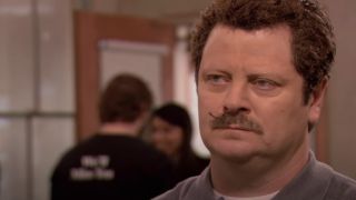 Nick Offerman as Ron Swanson, with no eyebrows