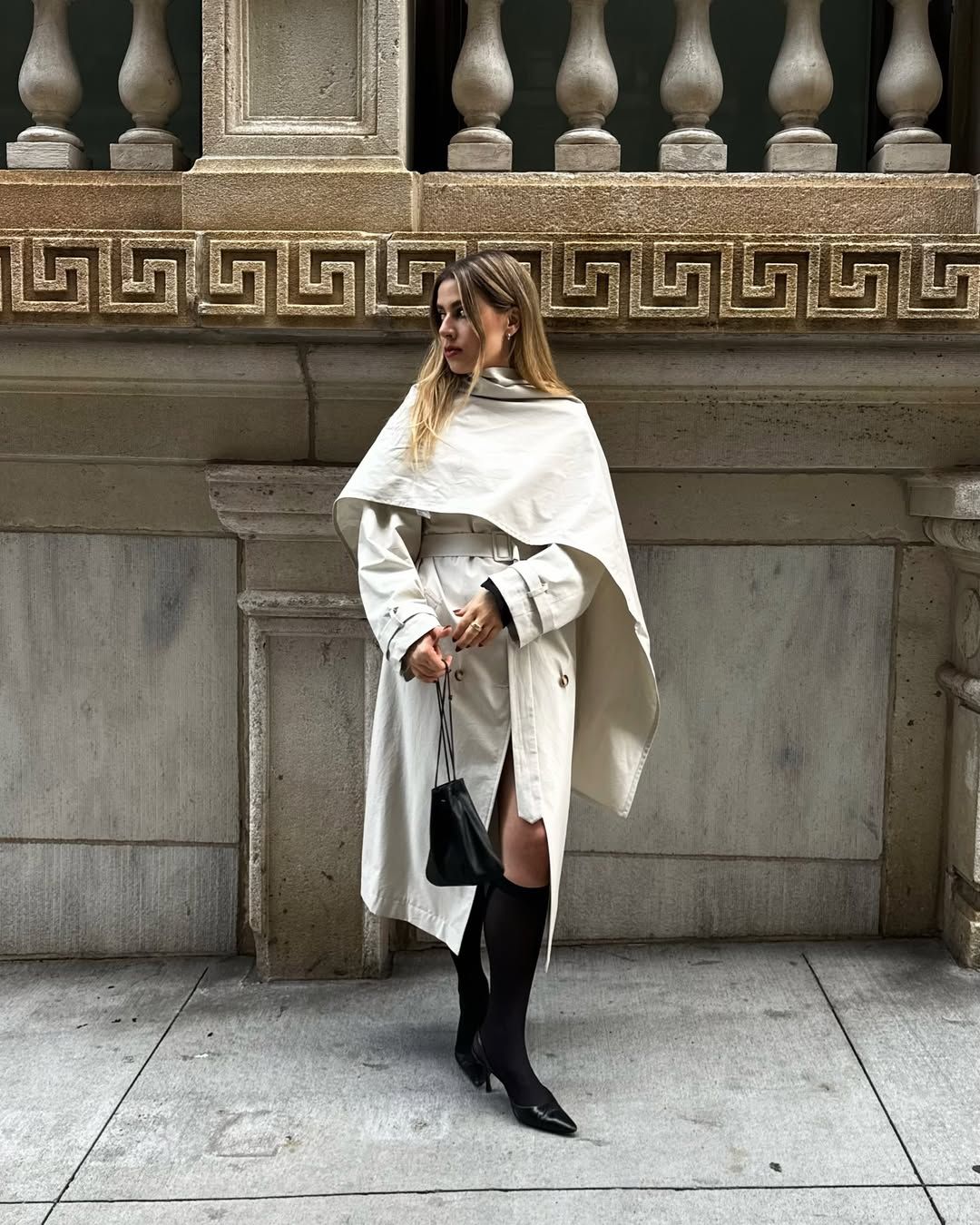 Christina Grasso wearing the pouch bag trend.