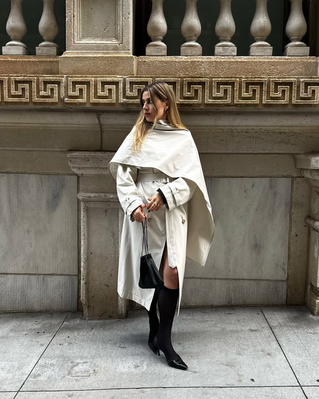 Christina Grasso wearing the pouch bag trend.