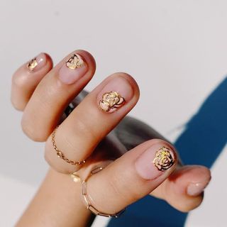 Gold rose nail design