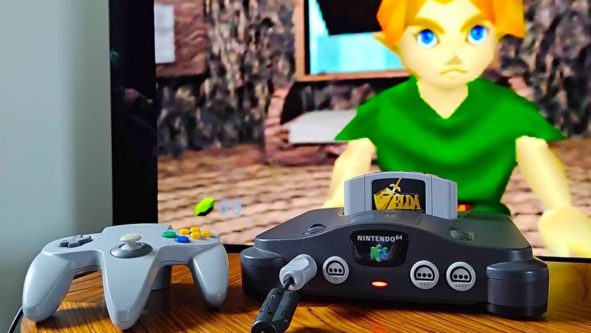 Close up of HDMI modded N64 on woodgrain coffee table with Zelda: Ocarina of Time gameplay on TV in backdrop.