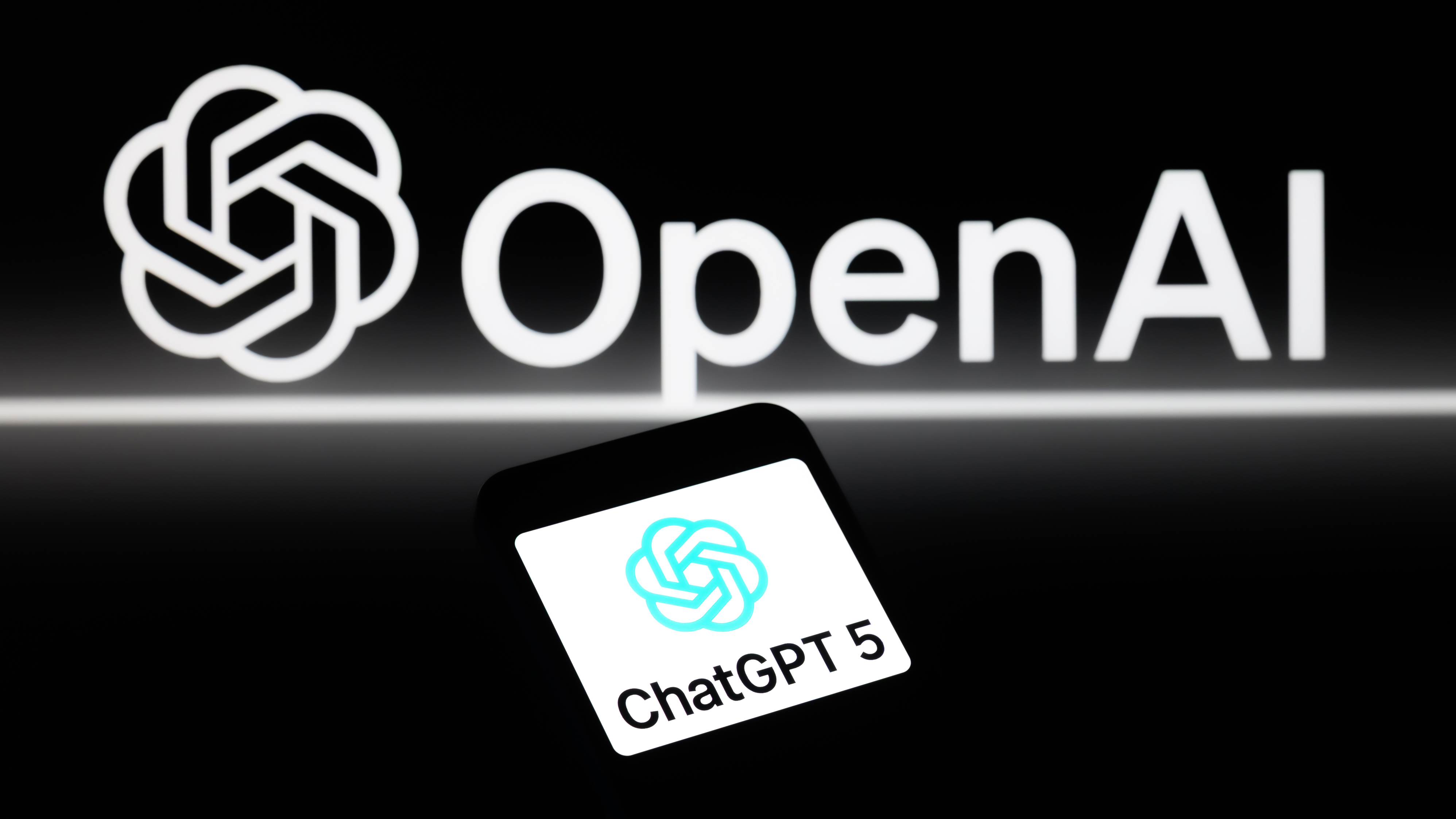 The ChatGPT 5 logo is displayed on a mobile phone. OpenAI announces GPT-5, its latest and most advanced AI model, in Brussels, Belgium, on August 7, 2025. (Photo by Jonathan Raa/NurPhoto via Getty Images)