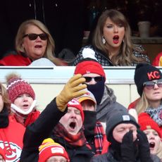 Taylor Swift with her family and Travis Kelce's parents in a private suite attending the AFC Divisional Playoff between the Houston Texans and the Kansas City Chiefs on January 18, 2025 in Kansas City.