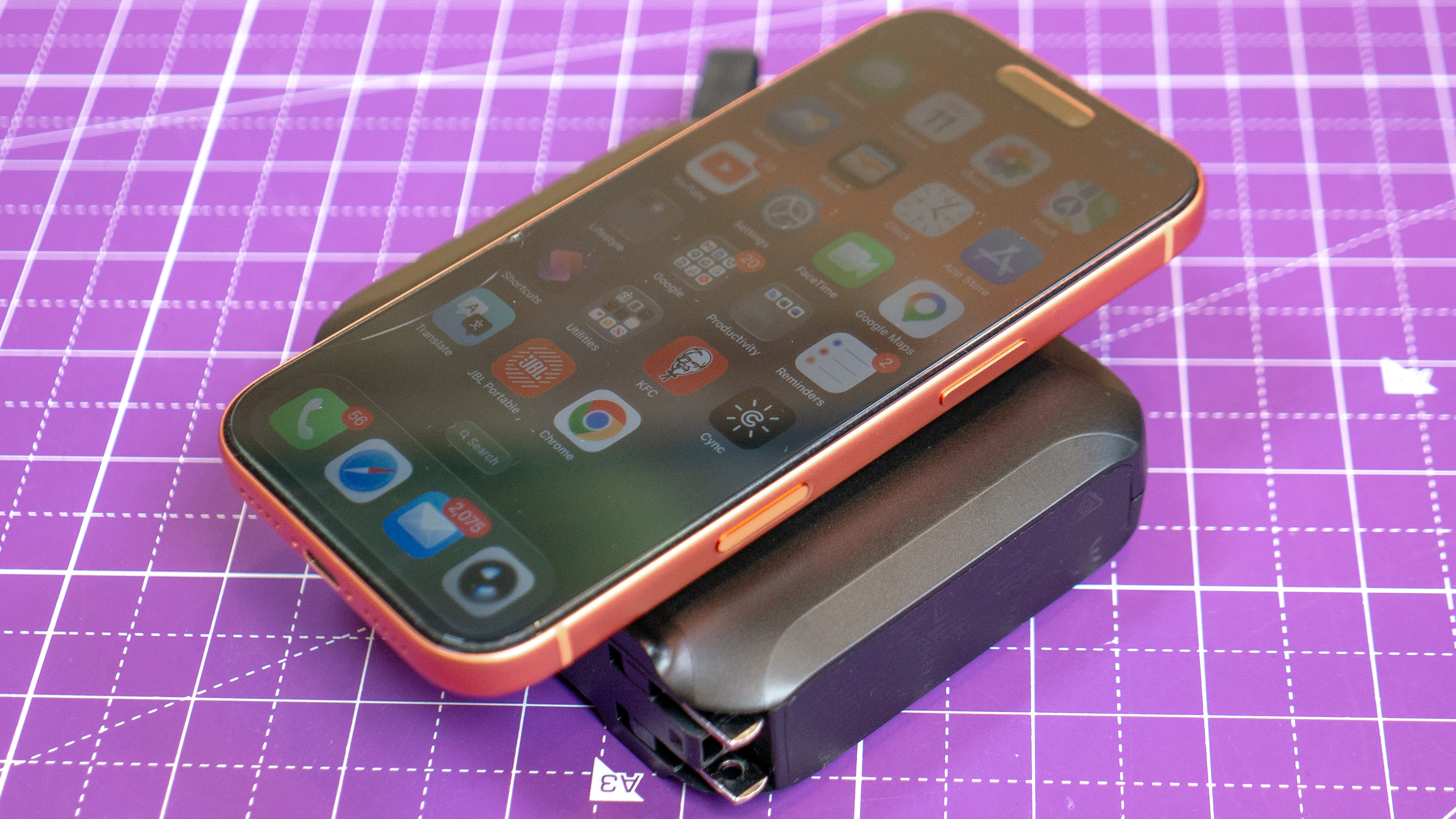 Statik SmartCharge Pro charging an iPhone.