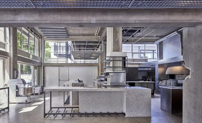 Kitchen, exposed concrete mixed with modern steel and marble counters