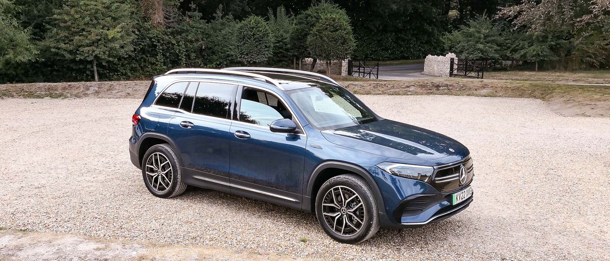 Mercedes-Benz EQB parked outside on gravel driveway