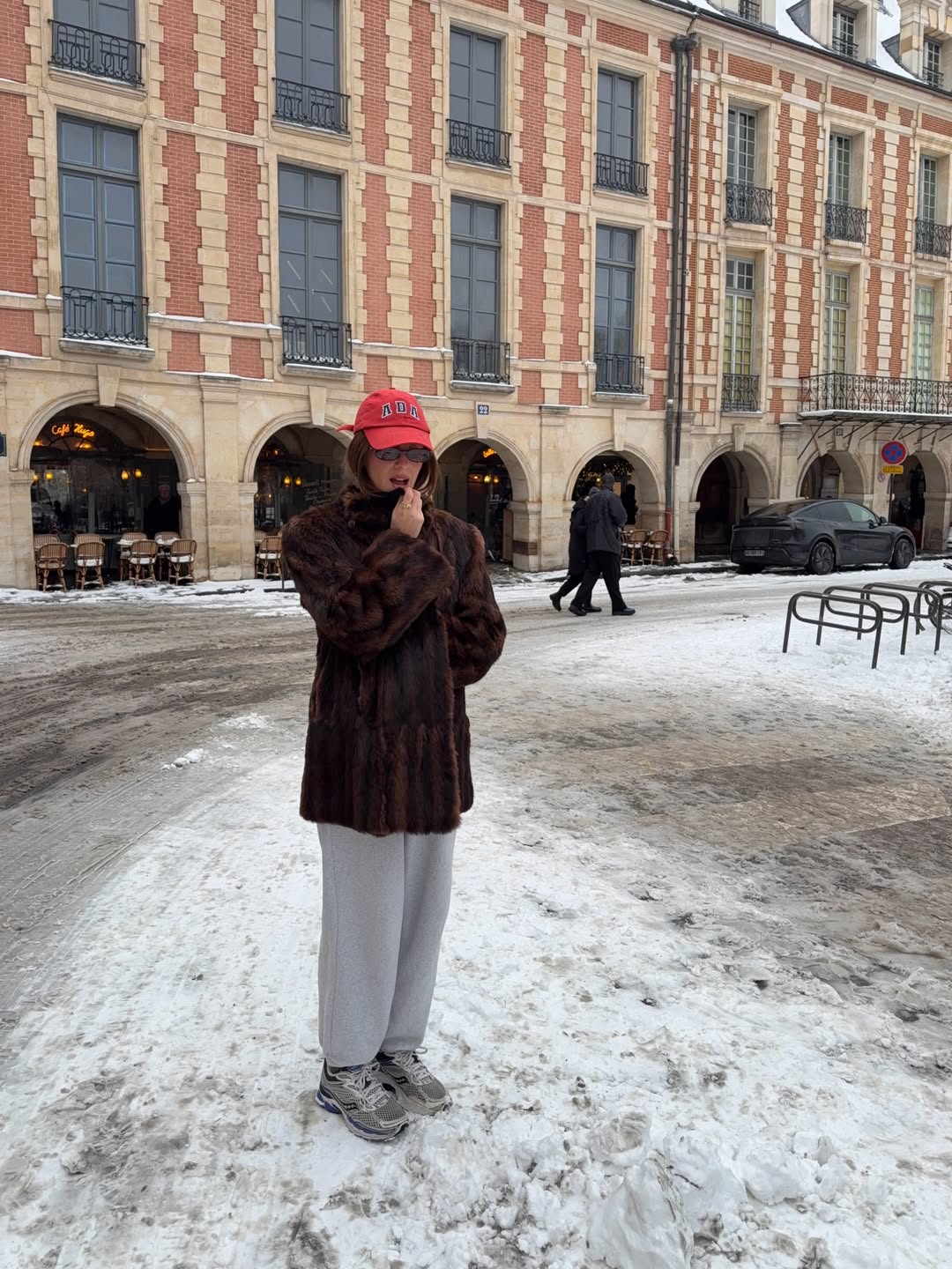 Cl&amp;eacute;mence Lopez wears track pants with a faux fur coat.