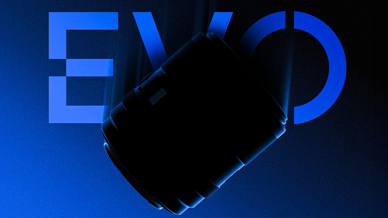 A silhouetted camera lens floats against a gradient blue background featuring bold text reading &quot;EVO&quot;