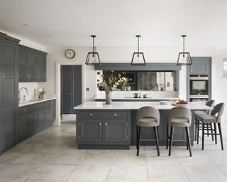 Grey and white kitchen ideas with dark grey cupboards and white worktops