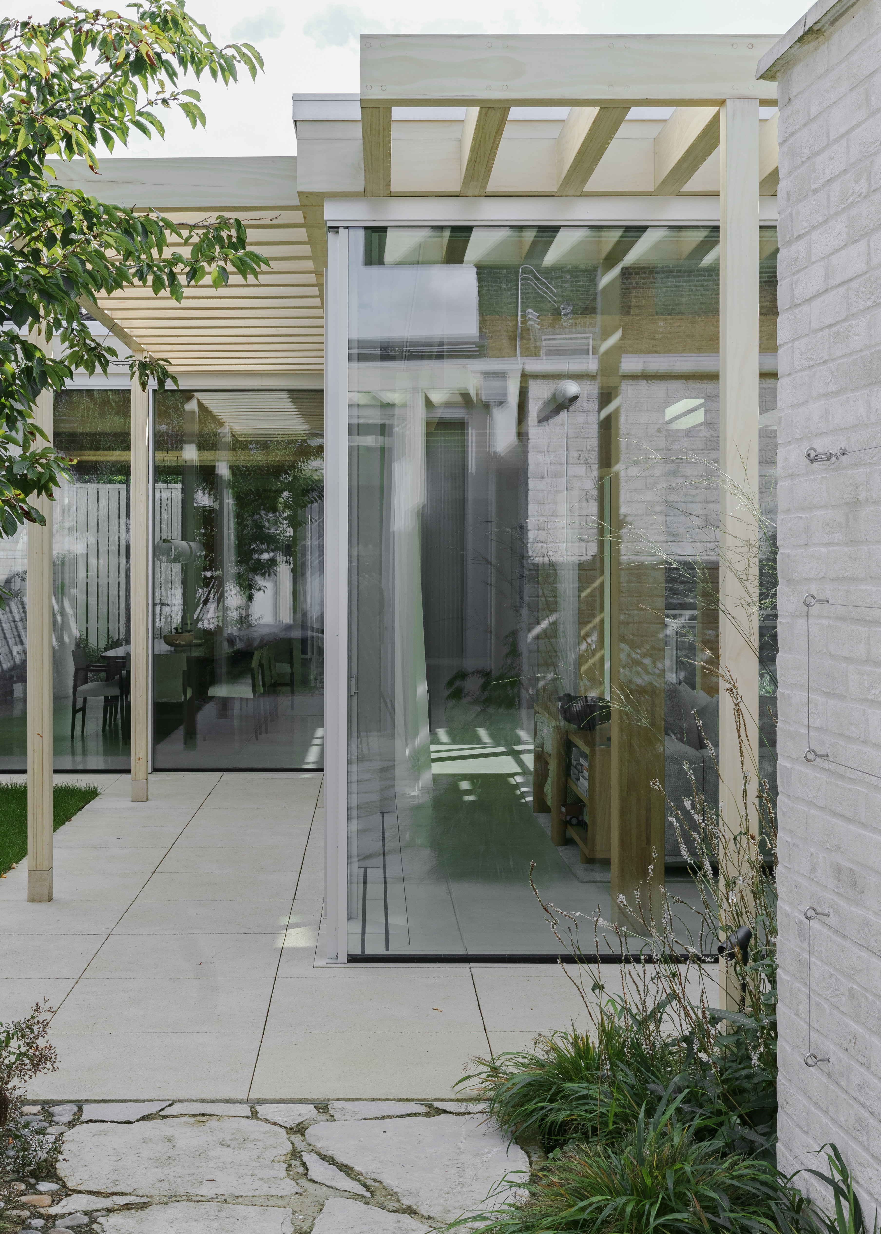 Large windows are the main feature of this grey building