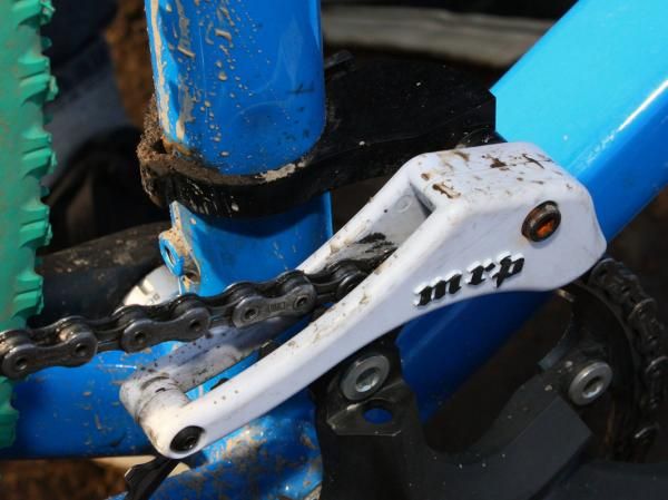 Clamps are available for different seat tube diameters and the box guide is laterally adjustable for chainline. This chain isn't going anywhere.