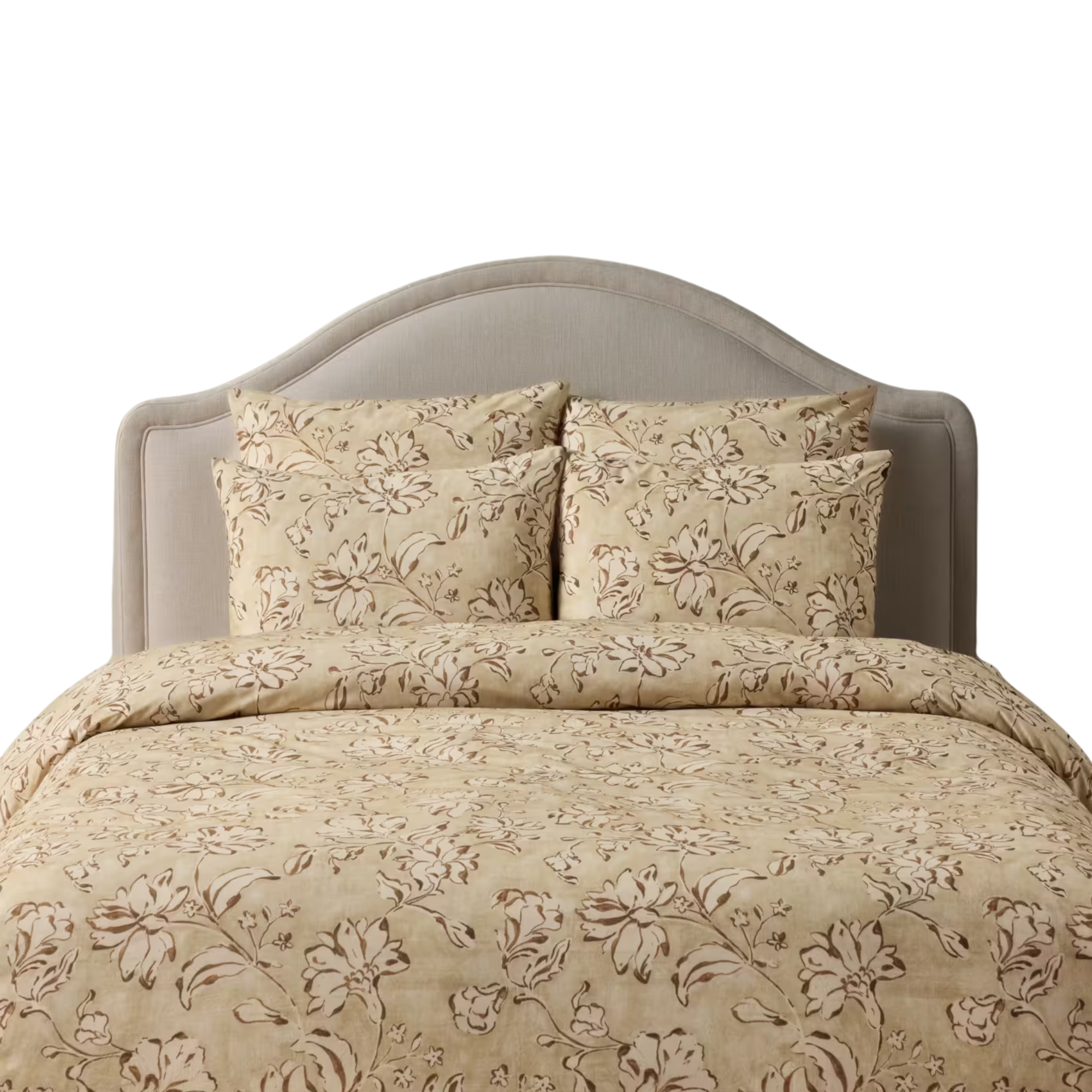 a duvet and pillows on a bed in a shade of yellow with a floral motif