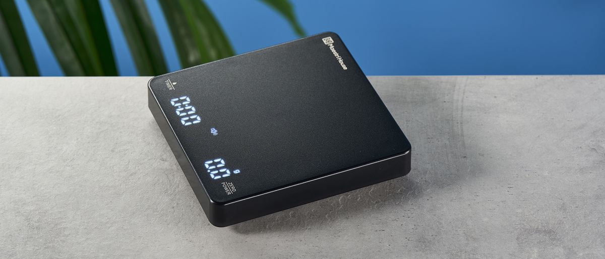 a black square coffee scale by Maestri House with a timer and a rechargeable battery