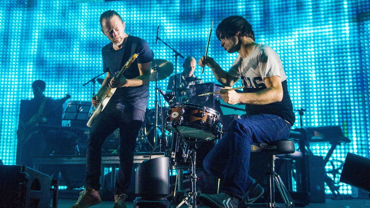 L-R: Thom Yorke, Phil Selway and Jonny Greenwood of Radiohead performing in 2012