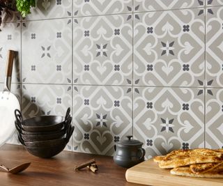 grey and white patterned wall tiles in kitchen